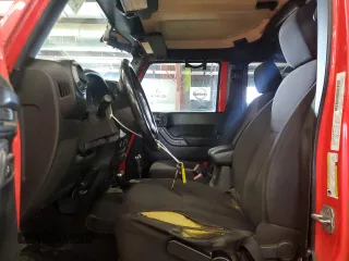 2013 Jeep Wrangler Unlimited Sport z VIN 1C4HJWDG5DL597192, wystawiony jako Copart lot #57300535 z przebiegiem 194 719 mil mil oraz Tytuł czysty. Historia ofert i sprzedaży dostępna na DreamBid. Obrazek 7.