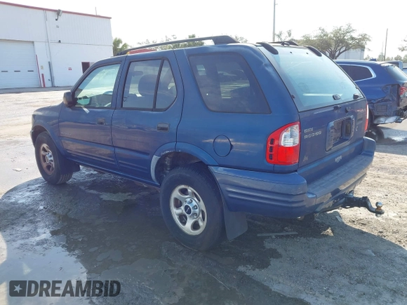 2004 Isuzu Rodeo S with VIN 4S2CK58W944317209, listed as a IAAI auction lot 41498160 with 114,764 mi miles and . Bid and sale history available at DreamBid. Image 3.