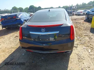 2014 Cadillac XTS Luxury z VIN 2G61M5S30E9229758, wystawiony jako IAAI lot #42179952 z przebiegiem 125 848 mil mil oraz . Historia ofert i sprzedaży dostępna na DreamBid. Obrazek 16.