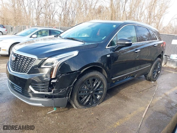2021 Cadillac XT5 AWD Premium Luxury with VIN 1GYKNDRS0MZ135660, listed as a IAAI auction lot 41123089 with 26,361 mi miles. Bid and sale history available at carsss.com. Image 2.