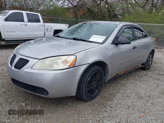 2006 Pontiac G6 6-Cyl z VIN 1G2ZG558064154096, wystawiony jako IAAI lot #41987316 z przebiegiem 221 130 mil mil oraz . Historia ofert i sprzedaży dostępna na DreamBid. Obrazek 22.