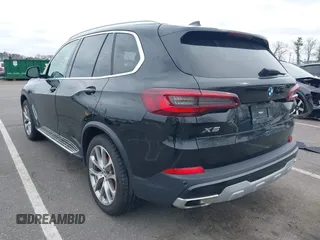 2023 BMW X5 xDrive40i with VIN 5UXCR6C0XP9P90557, listed as a IAAI auction lot 41860825 with 49,737 mi miles. Bid and sale history available at carsss.com. Image 3.