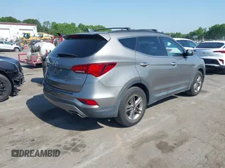 2017 Hyundai Santa Fe Sport 2.4L with VIN 5NMZU3LB9HH001167, listed as a IAAI auction lot 42061866 with 144,441 mi miles. Bid and sale history available at carsss.com. Image 4.