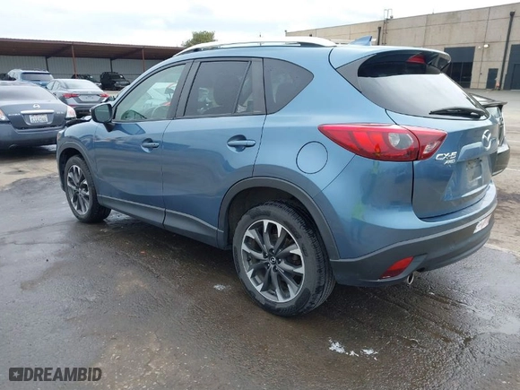 2016 Mazda CX-5 Grand Touring with VIN JM3KE4DY9G0726782, listed as a IAAI auction lot 41720512 with NaN miles. Bid and sale history available at carsss.com. Image 3.
