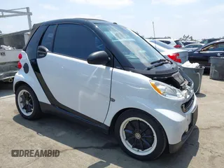 2008 Smart fortwo Passion z VIN WMEEK31X88K164790, wystawiony jako IAAI lot #42432822 z przebiegiem 44 036 mil mil oraz . Historia ofert i sprzedaży dostępna na DreamBid. Obrazek 1.