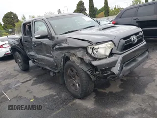 2014 Toyota Tacoma PreRunner with VIN 3TMJU4GN5EM167783, listed as a IAAI auction lot 42031603 with 179,574 mi miles and . Bid and sale history available at DreamBid. Image 1.