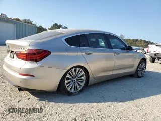 2014 BMW 5 Series GT 535i with VIN WBA5M2C55ED085766, listed as a Copart auction lot 76716934 with 151,144 mi miles and Salvage Title. Bid and sale history available at carsss.com. Image 4.
