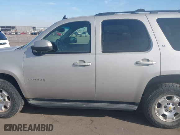 2009 Chevrolet Tahoe 1LT z VIN 1GNFK23049R133033, wystawiony jako IAAI lot #41140193 z przebiegiem 328 375 mil mil oraz . Historia ofert i sprzedaży dostępna na DreamBid. Obrazek 14.