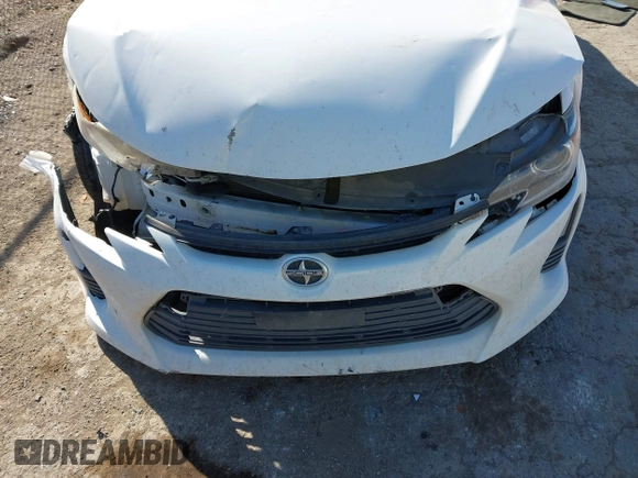 2014 Scion tC z VIN JTKJF5C74E3072410, wystawiony jako IAAI lot #41810965 z przebiegiem 147 164 mil mil oraz . Historia ofert i sprzedaży dostępna na DreamBid. Obrazek 6.