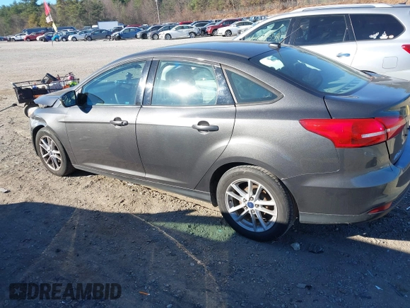 2015 Ford Focus SE with VIN 1FADP3F26FL280298, listed as a IAAI auction lot 40852000 with 144,805 mi miles and . Bid and sale history available at DreamBid. Image 14.