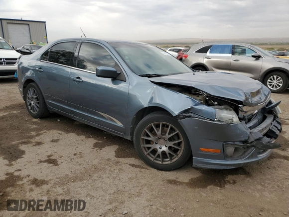 2012 Ford Fusion SE with VIN 3FAHP0HA2CR124891, listed as a Copart auction lot 76113714 with 184,628 mi miles and Salvage title. Bid and sale history available at DreamBid. Image 4.