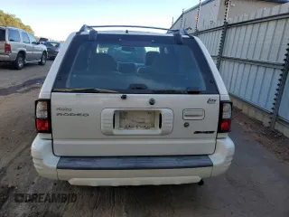 2000 Isuzu Rodeo S z VIN 4S2CK58W8Y4340907, wystawiony jako Copart lot #79683804 z przebiegiem 153 419 mil mil oraz Szkoda całkowita • Salvage title. Historia ofert i sprzedaży dostępna na DreamBid. Obrazek 6.
