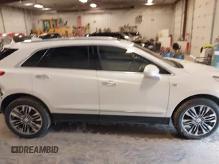 2019 Cadillac XT5 Luxury AWD z VIN 1GYKNDRS3KZ149162, wystawiony jako IAAI lot #42050088 z przebiegiem 109 364 mil mil oraz . Historia ofert i sprzedaży dostępna na DreamBid. Obrazek 13.