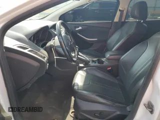 2013 Ford Focus SE with VIN 1FADP3F27DL258565, listed as a Copart auction lot 60662385 with 174,213 mi miles and Salvage title. Bid and sale history available at DreamBid. Image 7.