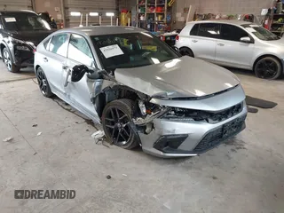 2023 Honda Civic Sport with VIN 19XFL2H80PE010679, listed as a IAAI auction lot 42026973 with 25,701 mi miles and . Bid and sale history available at DreamBid. Image 1.
