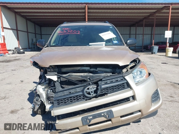 2009 Toyota RAV4 with VIN JTMZF33V995000660, listed as a IAAI auction lot 41633209 with 106,959 mi miles. Bid and sale history available at carsss.com. Image 12.