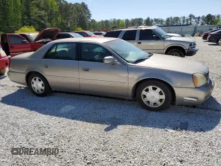 2003 Cadillac DeVille z VIN 1G6KD54Y63U250482, wystawiony jako Copart lot #52164515 z przebiegiem 131 376 mil mil oraz Szkoda całkowita • Salvage title. Historia ofert i sprzedaży dostępna na DreamBid. Obrazek 4.