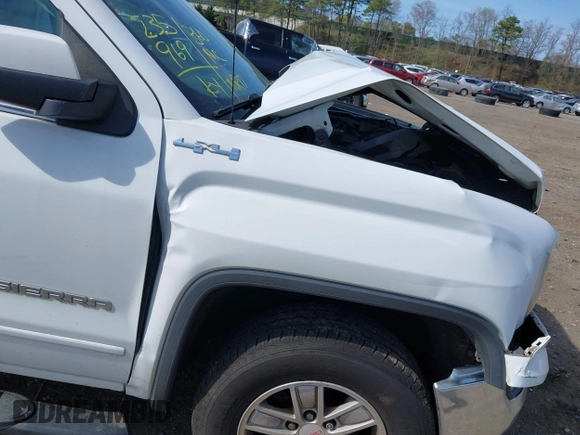 2017 GMC Sierra 1500 SLE z VIN 1GTV2MEC0HZ291794, wystawiony jako IAAI lot #42055172 z przebiegiem 235 969 mil mil oraz . Historia ofert i sprzedaży dostępna na DreamBid. Obrazek 19.
