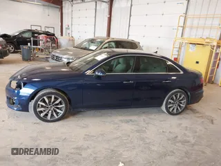 2023 Audi A4 Premium z VIN WAUABAF49PN011975, wystawiony jako IAAI lot #42298117 z przebiegiem 27 975 mil mil oraz . Historia ofert i sprzedaży dostępna na DreamBid. Obrazek 14.