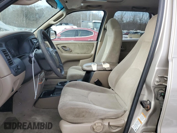 2001 Mazda Tribute LX with VIN 4F2CU081X1KM70119, listed as a Copart auction lot 89311935 with 176,851 mi miles and Salvage Title. Bid and sale history available at DreamBid. Image 7.