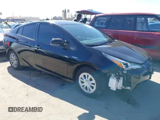 2021 Toyota Prius L Eco with VIN JTDKAMFU3M3148574, listed as a IAAI auction lot 41624303 with 89,747 mi miles. Bid and sale history available at carsss.com. Image 1.