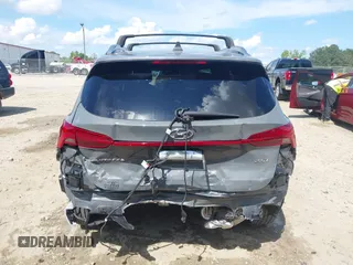 2023 Hyundai Santa Fe Calligraphy with VIN 5NMS54ALXPH633514, listed as a IAAI auction lot 42238114 with 12,969 mi miles and . Bid and sale history available at DreamBid. Image 16.