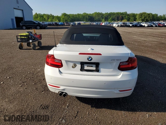2015 BMW 2 Series 228i with VIN WBA1K5C51FV474079, listed as a Copart auction lot 57457875 with 62,946 mi miles and Salvage title. Bid and sale history available at DreamBid. Image 6.