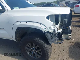 2023 Toyota Tacoma SR with VIN 3TYCZ5AN2PT112854, listed as a IAAI auction lot 42220025 with 43,657 mi miles and . Bid and sale history available at DreamBid. Image 18.