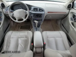 1999 Oldsmobile Cutlass GLS z VIN 1G3NG52J3X6333871, wystawiony jako Copart lot #73892304 z przebiegiem 44 280 mil mil oraz Tytuł czysty. Historia ofert i sprzedaży dostępna na DreamBid. Obrazek 8.
