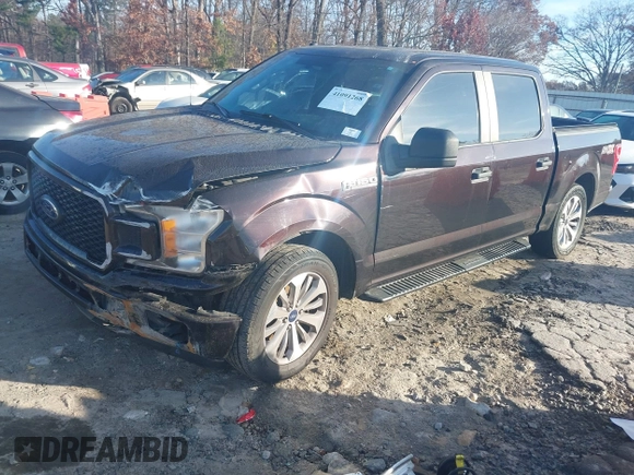 2018 Ford F-150 XL with VIN 1FTEW1C50JFA26307, listed as a IAAI auction lot 41091268 with 129,012 mi miles and . Bid and sale history available at DreamBid. Image 2.