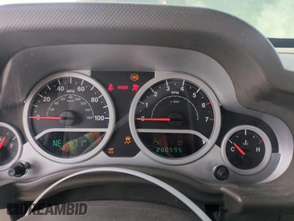 2010 Jeep Wrangler Sport with VIN 1J4AA2D16AL127197, listed as a Copart auction lot 54192935 with 200,595 mi miles and Clean Title. Bid and sale history available at carsss.com. Image 9.