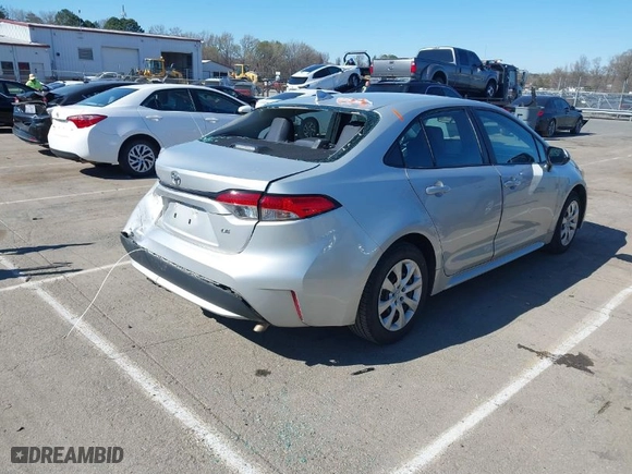 2021 Toyota Corolla LE with VIN 5YFEPMAE5MP173219, listed as a IAAI auction lot 41816423 with 64,451 mi miles. Bid and sale history available at carsss.com. Image 4.