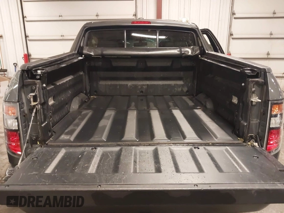 2008 Honda Ridgeline RTL with VIN 2HJYK16588H534551, listed as a IAAI auction lot 42196016 with 141,474 mi miles and . Bid and sale history available at DreamBid. Image 13.