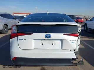 2021 Toyota Prius L Eco with VIN JTDKAMFU7M3133544, listed as a IAAI auction lot 41548653 with 115,214 mi miles. Bid and sale history available at carsss.com. Image 17.