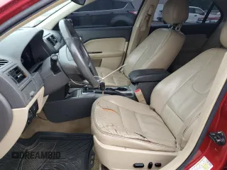 2012 Ford Fusion SEL z VIN 3FAHP0JG2CR309554, wystawiony jako Copart lot #60869895 z przebiegiem 199 134 mil mil oraz Szkoda całkowita • Salvage title. Historia ofert i sprzedaży dostępna na DreamBid. Obrazek 7.