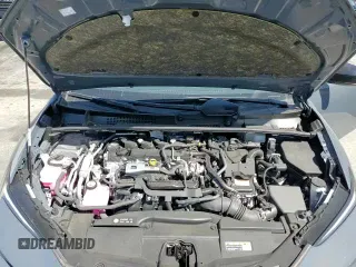 2024 Toyota Prius SE z VIN JTDACACUXR3016007, wystawiony jako Copart lot #71554375 z przebiegiem 7 203 mil mil oraz Szkoda całkowita • Salvage title. Historia ofert i sprzedaży dostępna na DreamBid. Obrazek 14.