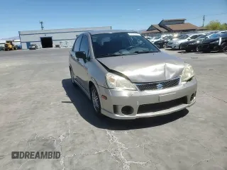 2006 Suzuki Aerio Premium z VIN JS2RA62S165300427, wystawiony jako Copart lot #57363605 z przebiegiem 141 824 mil mil oraz Szkoda całkowita • Salvage title. Historia ofert i sprzedaży dostępna na DreamBid. Obrazek 13.