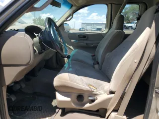 2000 Ford F-150 XL with VIN 1FTRX18L3YKA77727, listed as a Copart auction lot 58774135 with Not provided miles and Clean title. Bid and sale history available at DreamBid. Image 7.