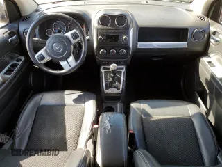 2016 Jeep Compass High Altitude Edition with VIN 1C4NJCEA4GD792582, listed as a Copart auction lot 48812395 with 181,896 mi miles and Salvage Title. Bid and sale history available at carsss.com. Image 8.