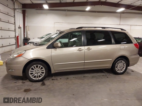 2009 Toyota Sienna XLE with VIN 5TDZK22CX9S236850, listed as a IAAI auction lot 42303935 with 201,583 mi miles and . Bid and sale history available at DreamBid. Image 14.