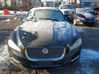 2012 Jaguar XJ with VIN SAJWA2GB0CLV25378, listed as a IAAI auction lot 41416644 with 90,582 mi miles. Bid and sale history available at carsss.com. Image 6.