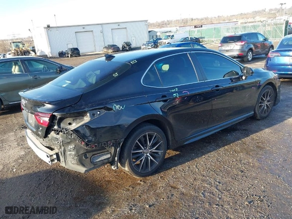 2021 Toyota Camry SE Nightshade with VIN 4T1G11AK7MU574557, listed as a IAAI auction lot 41111326 with 103,019 mi miles. Bid and sale history available at carsss.com. Image 4.