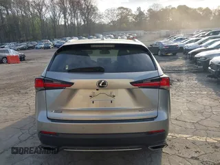 2021 Lexus NX 300 F Sport z VIN JTJSARBZ1M2193319, wystawiony jako IAAI lot #41876755 z przebiegiem 30 332 mil mil oraz . Historia ofert i sprzedaży dostępna na DreamBid. Obrazek 16.