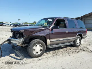 1997 GMC Yukon with VIN 1GKEK13R7VJ711782, listed as a Copart auction lot 74793184 with 208,718 mi miles and Salvage Title. Bid and sale history available at carsss.com. Image 1.