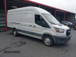 2023 Ford Transit Cargo z VIN 1FTBR3U89PKB38182, wystawiony jako IAAI lot #42710478 z przebiegiem 78 774 mil mil oraz . Historia ofert i sprzedaży dostępna na DreamBid. Obrazek 1.
