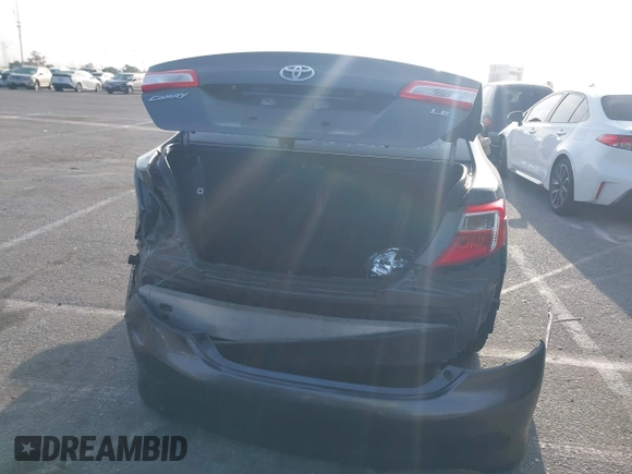 2014 Toyota Camry L with VIN 4T4BF1FK7ER430132, listed as a IAAI auction lot 41912773 with 215,073 mi miles. Bid and sale history available at carsss.com. Image 17.