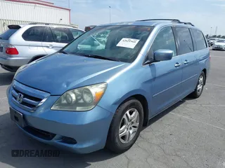 2006 Honda Odyssey EX-L z VIN 5FNRL38706B075356, wystawiony jako IAAI lot #42021960 z przebiegiem 120 455 mil mil oraz . Historia ofert i sprzedaży dostępna na DreamBid. Obrazek 2.