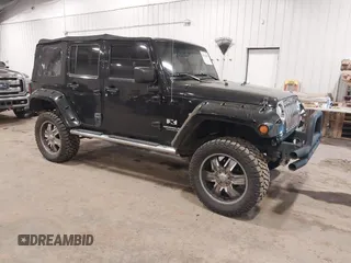 2008 Jeep Wrangler Unlimited X with VIN 1J4GA391X8L558984, listed as a IAAI auction lot 41016498 with 123,308 mi miles. Bid and sale history available at carsss.com. Image 1.