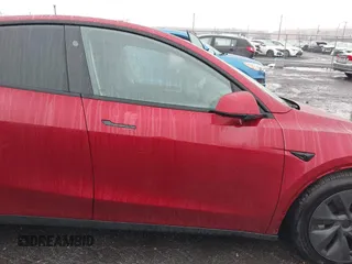 2024 Tesla Model Y Long Range with VIN 7SAYGAEE7RF133073, listed as a IAAI auction lot 41081463 with Not Provided miles and . Bid and sale history available at DreamBid. Image 5.