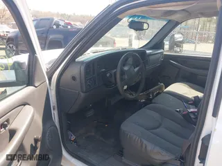 2003 Chevrolet Silverado 1500 Work Truck with VIN 1GCEC19X33Z360141, listed as a IAAI auction lot 42077431 with 180,000 mi miles. Bid and sale history available at carsss.com. Image 5.